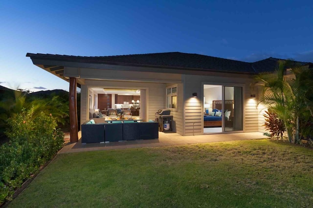 68-1122 Kaniku Dr Unit 426, Kamuela, HI 96743 - back of property featuring outdoor lounge area, a lawn, and a patio
