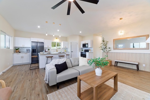 16-2102 Leilani Dr, Pahoa, HI 96778 - living area with light wood-style flooring, a ceiling fan, lofted ceiling, and recessed lighting