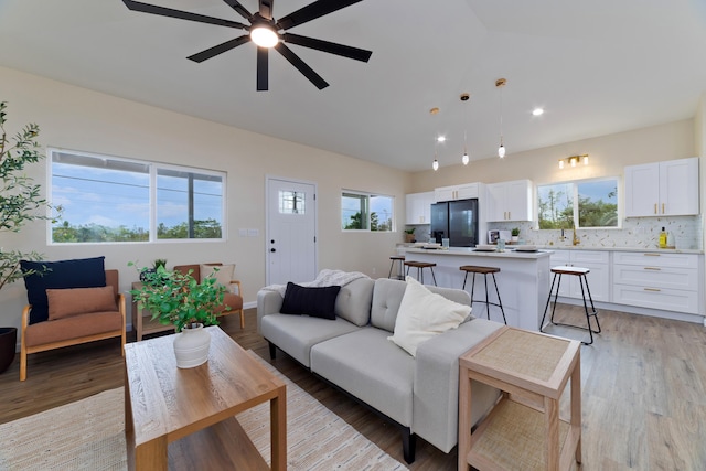 16-2102 Leilani Dr, Pahoa, HI 96778 - living room with a ceiling fan, light wood-type flooring, recessed lighting, and lofted ceiling
