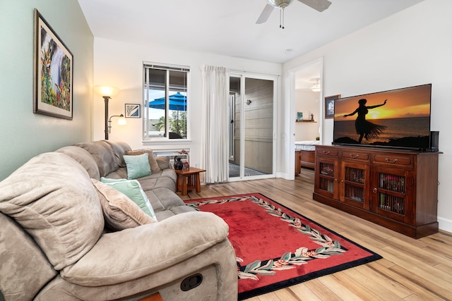 75-5919 Alii Dr Unit M3, Kailua-Kona, HI 96740 - living area with ceiling fan and wood finished floors