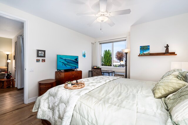 75-5919 Alii Dr Unit M3, Kailua-Kona, HI 96740 - bedroom with wood finished floors and ceiling fan