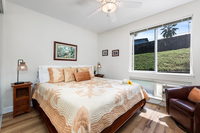 75-5919 Alii Dr Unit M3, Kailua-Kona, HI 96740 - bedroom featuring wood finished floors and ceiling fan