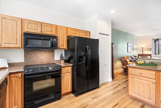 75-5919 Alii Dr Unit M3, Kailua-Kona, HI 96740 - kitchen with black appliances, light wood-style flooring, decorative backsplash, and recessed lighting