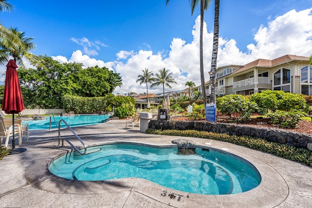 75-5919 Alii Dr Unit M3, Kailua-Kona, HI 96740 - community pool with a patio and a hot tub