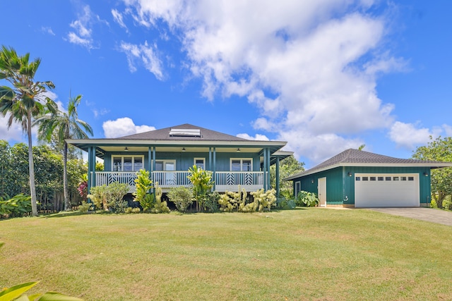 2645 Keoki Pl, Kalaheo, HI 96741 - view of front of property featuring a front lawn, concrete driveway, an attached garage, and covered porch