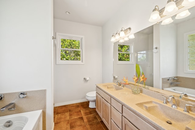 2645 Keoki Pl, Kalaheo, HI 96741 - bathroom featuring healthy amount of natural light, a garden tub, double vanity, and tile patterned floors