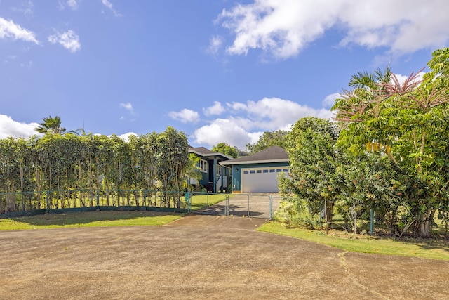2645 Keoki Pl, Kalaheo, HI 96741 - view of property hidden behind natural elements with concrete driveway and a gate