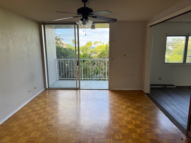 75-5766 Kuakini Hwy Unit 210, Kailua-Kona, HI 96740 - spare room with a ceiling fan and a baseboard radiator