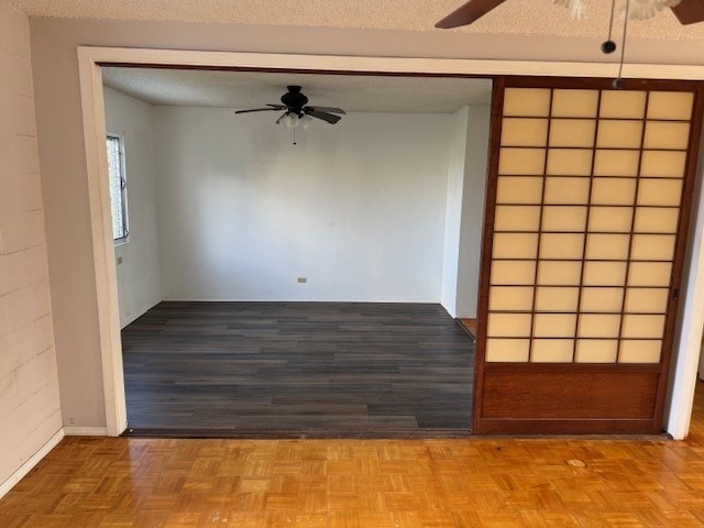 75-5766 Kuakini Hwy Unit 210, Kailua-Kona, HI 96740 - empty room with a ceiling fan and a textured ceiling