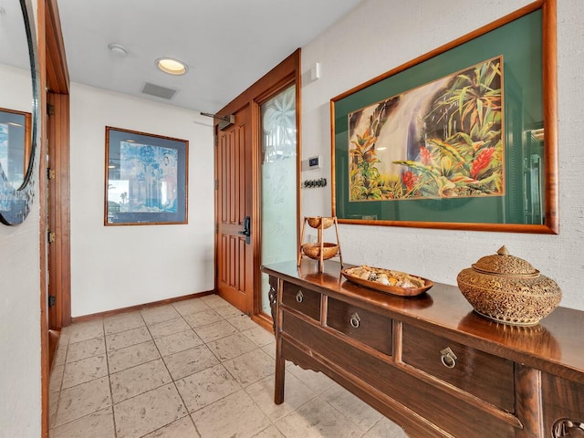 68-1399 Mauna Lani Dr Unit D201, Kamuela, HI 96743 - hallway featuring baseboards and light tile patterned flooring