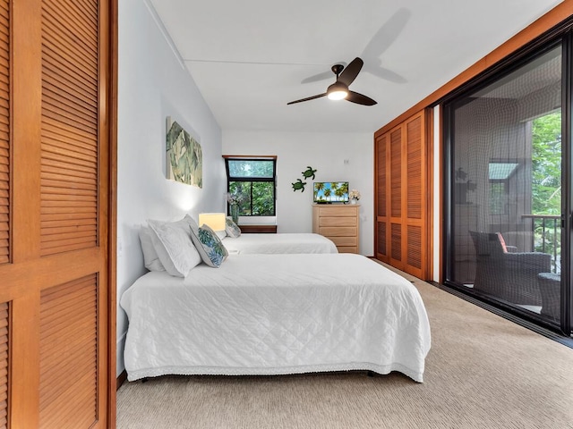 68-1399 Mauna Lani Dr Unit D201, Kamuela, HI 96743 - carpeted bedroom with access to outside and a ceiling fan