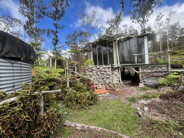 11-3119 Alii Anela St, Volcano, HI 96785 - view of yard featuring a sunroom