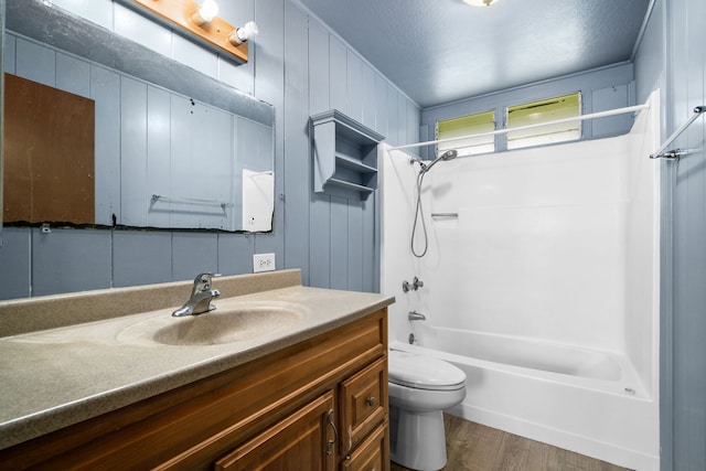 3878 Mamaki St, Koloa, HI 96756 - bathroom featuring vanity, tub / shower combination, and wood finished floors