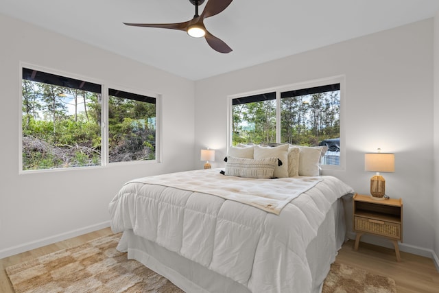 16-2072 Kuhio Dr, Pahoa, HI 96778 - bedroom featuring wood finished floors and a ceiling fan