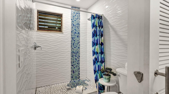 2253 Poipu Rd Unit 216, Koloa, HI 96756 - full bathroom with a tile shower and toilet