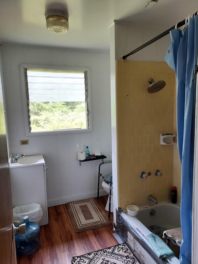 17-4136 Kukui Camp Rd, Mountain View, HI 96771 - bathroom with shower / bathtub combination with curtain, wood finished floors, and vanity