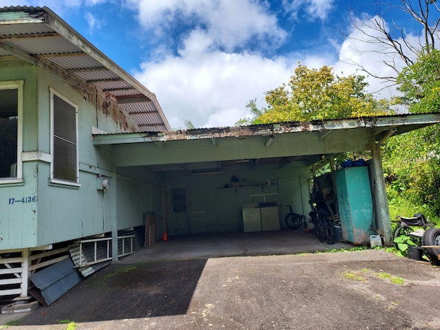 17-4136 Kukui Camp Rd, Mountain View, HI 96771 - view of side of home with driveway and a carport