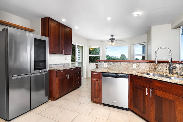 79-1145 Kao Rd, Holualoa, HI 96725 - kitchen featuring stainless steel appliances, ceiling fan, light stone counters, recessed lighting, and light tile patterned floors