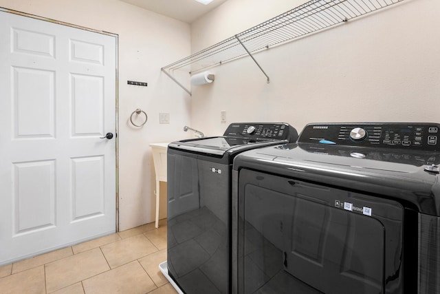 79-1145 Kao Rd, Holualoa, HI 96725 - washroom featuring washing machine and clothes dryer and light tile patterned flooring