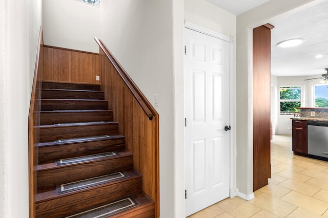 79-1145 Kao Rd, Holualoa, HI 96725 - stairway featuring a ceiling fan, wooden walls, and tile patterned floors