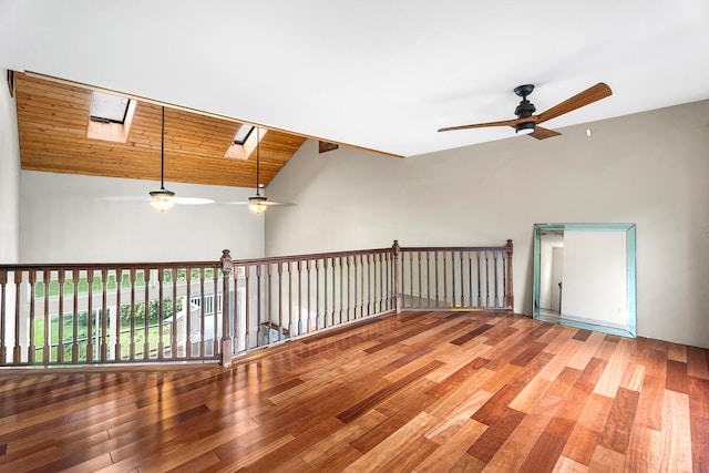 79-1145 Kao Rd, Holualoa, HI 96725 - empty room featuring ceiling fan, vaulted ceiling, wood finished floors, and a skylight