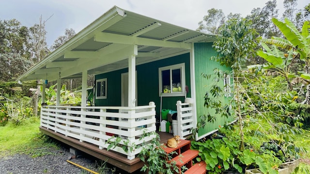 11-3170 Anuhea St, Volcano, HI 96785 - view of side of home with a porch