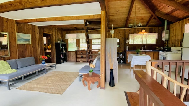 11-3170 Anuhea St, Volcano, HI 96785 - living area with wood walls, beam ceiling, and water heater