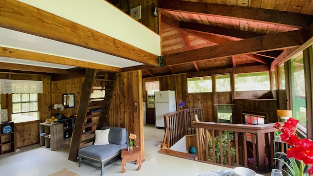 11-3170 Anuhea St, Volcano, HI 96785 - living room with finished concrete floors and wooden walls