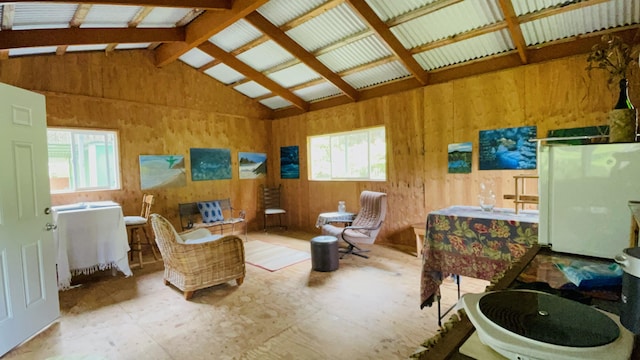 11-3170 Anuhea St, Volcano, HI 96785 - living room with lofted ceiling and wood walls
