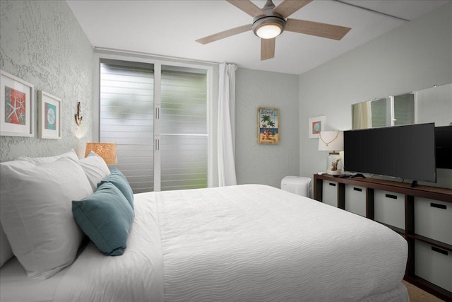 75-6016 Alii Dr Unit 323, Kailua-Kona, HI 96740 - bedroom featuring a textured wall and ceiling fan