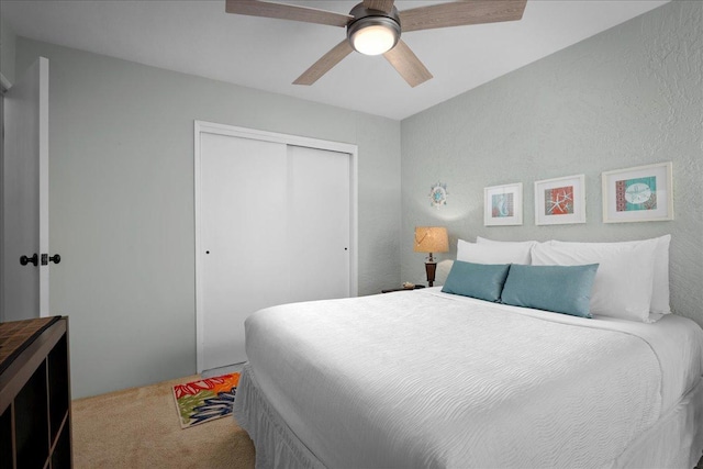 75-6016 Alii Dr Unit 323, Kailua-Kona, HI 96740 - carpeted bedroom with a closet and ceiling fan