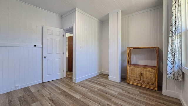 48-5241 Kukuihaele Rd, Honokaa, HI 96727 - unfurnished bedroom with wood finished floors and wooden walls