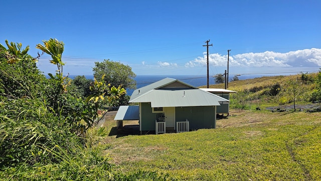 48-5241 Kukuihaele Rd, Honokaa, HI 96727 - view of side of property featuring a lawn