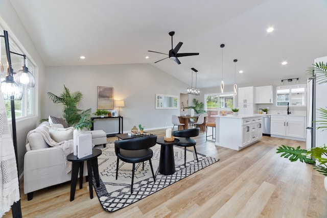 16-2148 Pukalani Dr, Pahoa, HI 96778 - living room with ceiling fan, plenty of natural light, lofted ceiling, light wood-type flooring, and recessed lighting