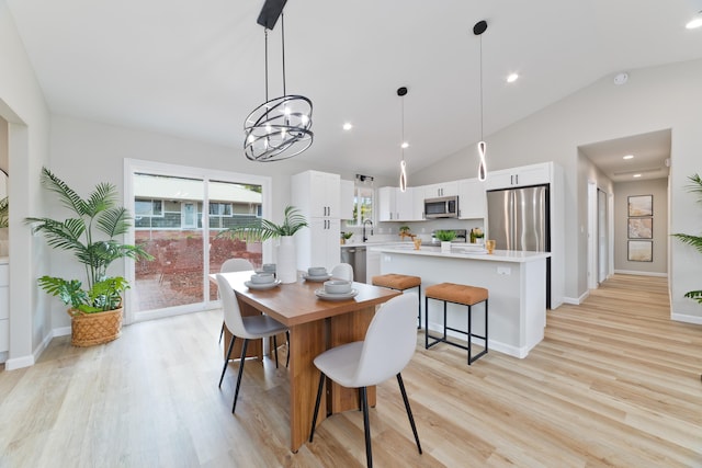 16-2148 Pukalani Dr, Pahoa, HI 96778 - dining space with vaulted ceiling, light wood-type flooring, a chandelier, and recessed lighting
