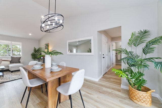 16-2148 Pukalani Dr, Pahoa, HI 96778 - dining room with light wood-style flooring, lofted ceiling, a chandelier, and recessed lighting
