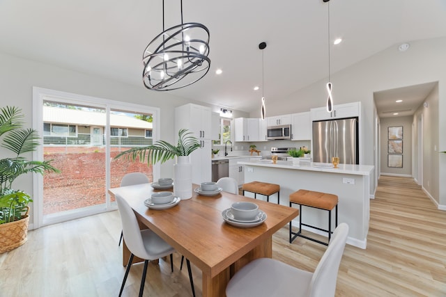 16-2148 Pukalani Dr, Pahoa, HI 96778 - dining space with light wood-style floors, lofted ceiling, a chandelier, and recessed lighting