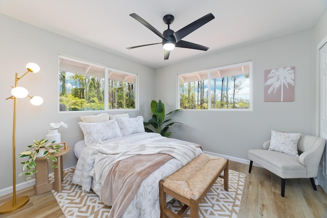 16-2148 Pukalani Dr, Pahoa, HI 96778 - bedroom with light wood-type flooring and a ceiling fan