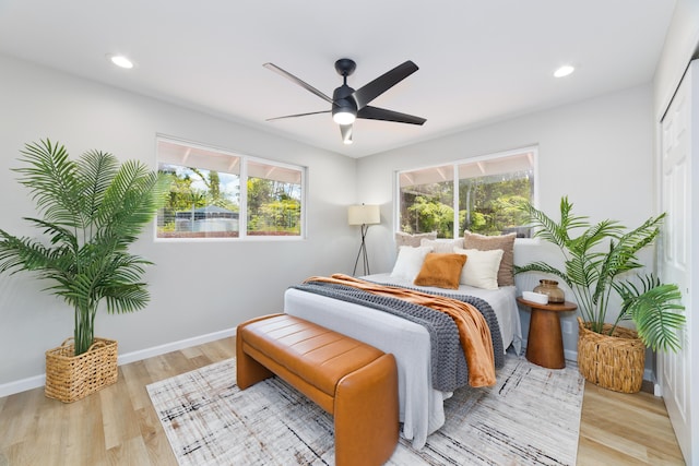 16-2148 Pukalani Dr, Pahoa, HI 96778 - bedroom featuring multiple windows, wood finished floors, recessed lighting, and ceiling fan