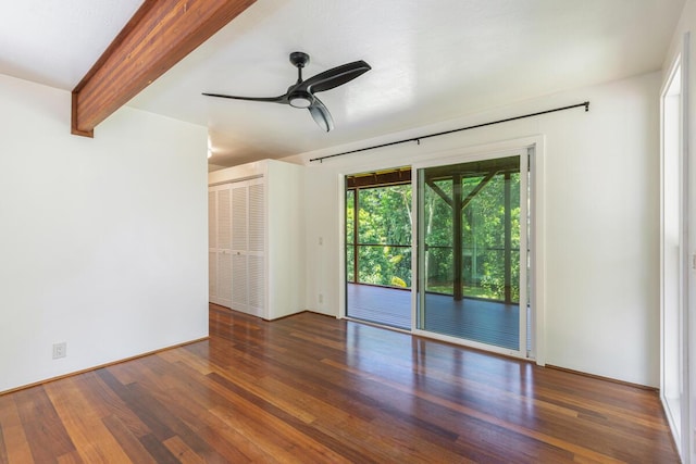 4417-B Kahili Makai St Unit D, Kilauea, HI 96754 - unfurnished room with wood finished floors, ceiling fan, and beam ceiling
