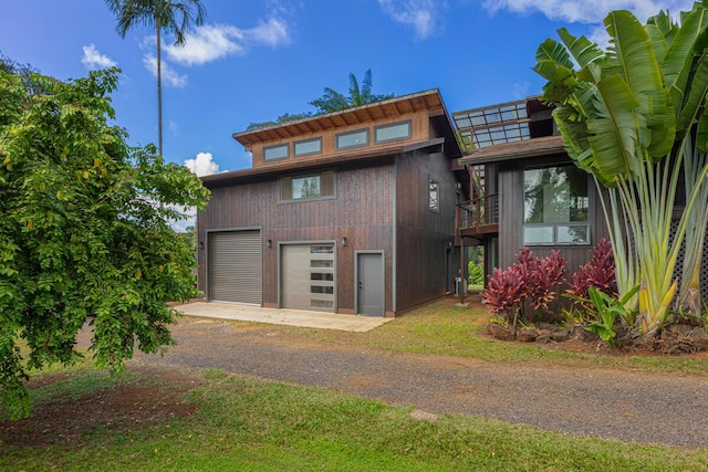 4417-B Kahili Makai St Unit D, Kilauea, HI 96754 - view of front of house featuring dirt driveway