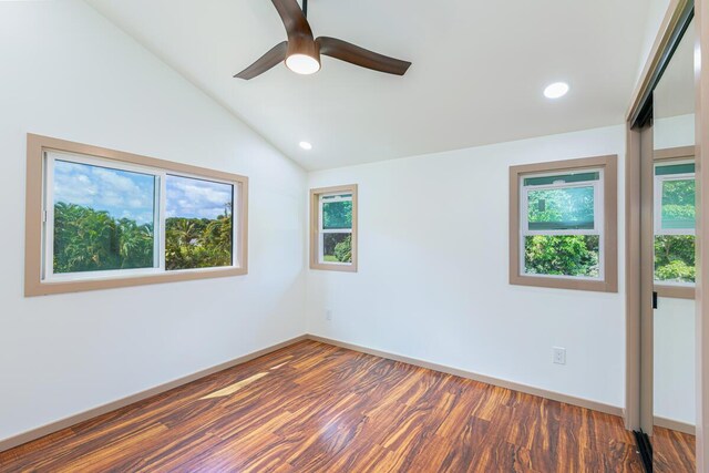 4417-B Kahili Makai St Unit D, Kilauea, HI 96754 - spare room with healthy amount of natural light, wood finished floors, ceiling fan, lofted ceiling, and recessed lighting