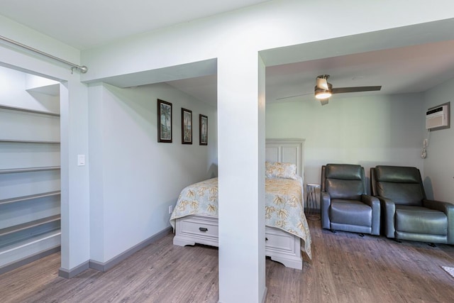 4417-B Kahili Makai St Unit D, Kilauea, HI 96754 - bedroom featuring wood finished floors and a wall unit AC