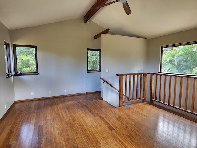 4417-B Kahili Makai St Unit D, Kilauea, HI 96754 - empty room featuring hardwood / wood-style floors, healthy amount of natural light, and a ceiling fan