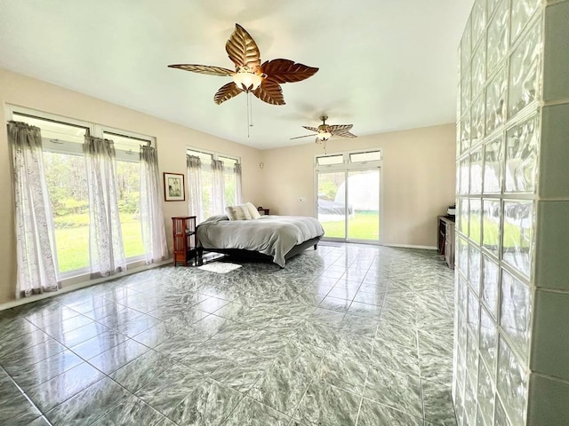 11-2920 S Apele Rd, Mountain View, HI 96771 - bedroom with access to exterior and ceiling fan