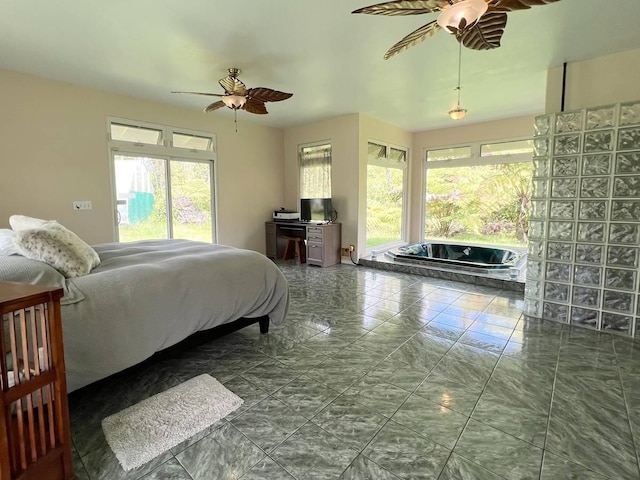 11-2920 S Apele Rd, Mountain View, HI 96771 - bedroom with multiple windows and a ceiling fan