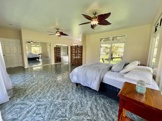 11-2920 S Apele Rd, Mountain View, HI 96771 - bedroom featuring multiple windows, marble look tile flooring, access to exterior, and ceiling fan