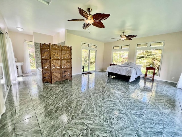11-2920 S Apele Rd, Mountain View, HI 96771 - bedroom with marble look tiles, access to exterior, and ceiling fan