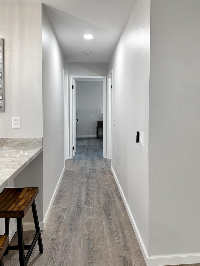 68-3831 Lua Kula St Unit H202, Waikoloa, HI 96738 - hall featuring wood finished floors and baseboards