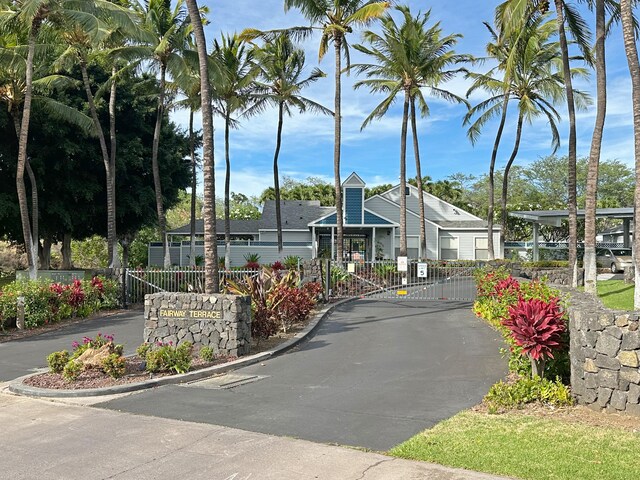 68-3831 Lua Kula St Unit H202, Waikoloa, HI 96738 - view of asphalt street featuring a gate, a gated entry, and curbs